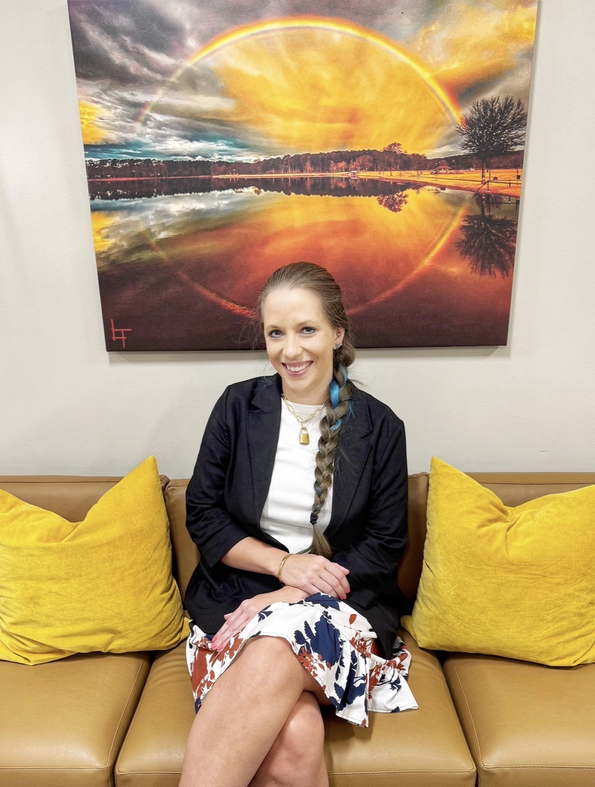 Rachel sitting on a couch